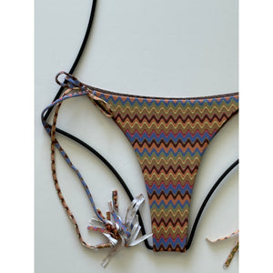Close-up of Acacia Swimwear Lauie bikini bottom in Mada, highlighting the detailed zigzag print in brown, blue, and coral hues