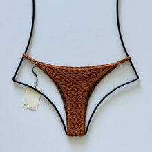 Back flat lay of Acacia Swimwear Neema Crochet Bikini Bottom in Tobacco with lining visible.