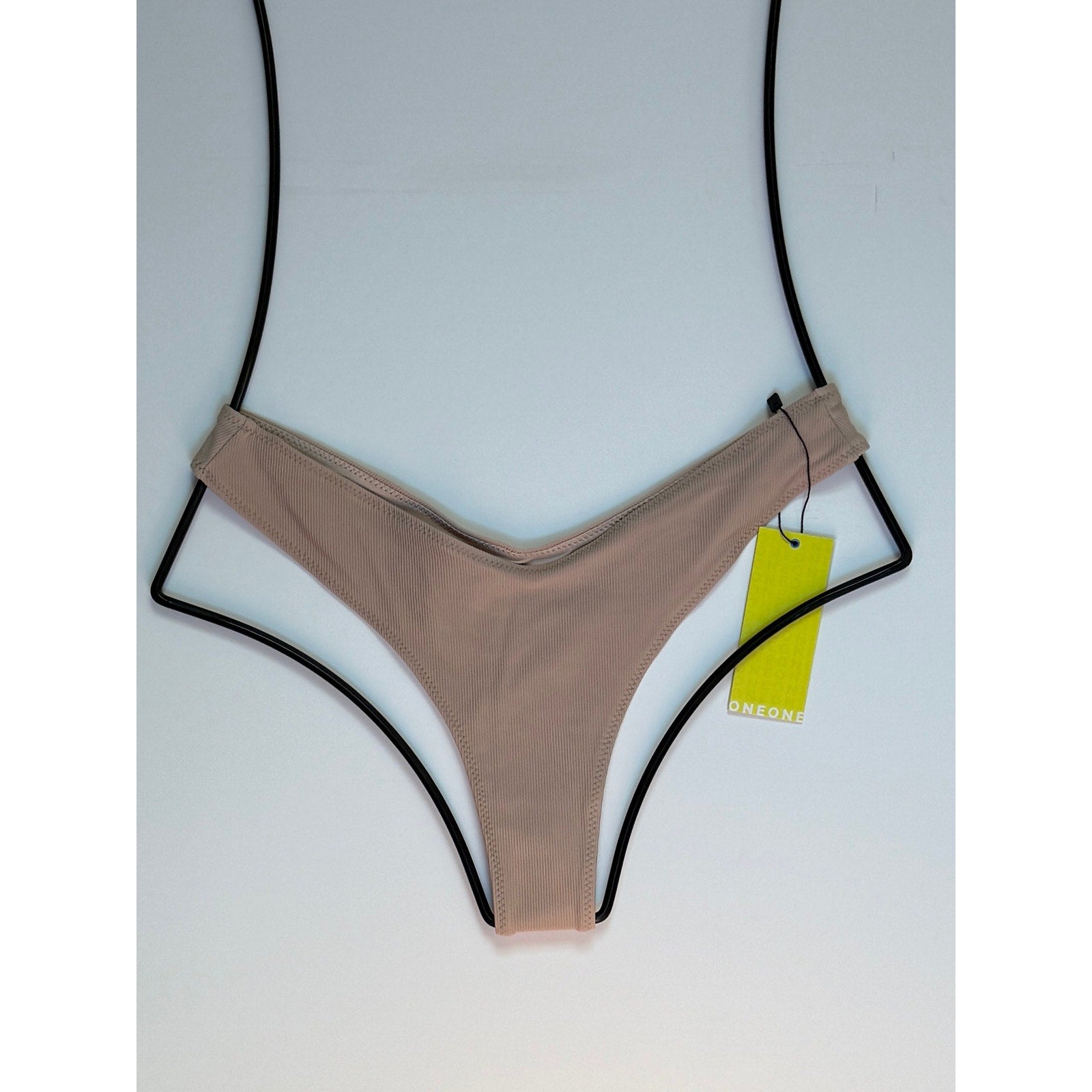 OneOne Swimwear Heidi Skimpy Bikini Bottom – Sand Ribbed | Front view